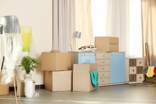 Man with a van loading items for transport