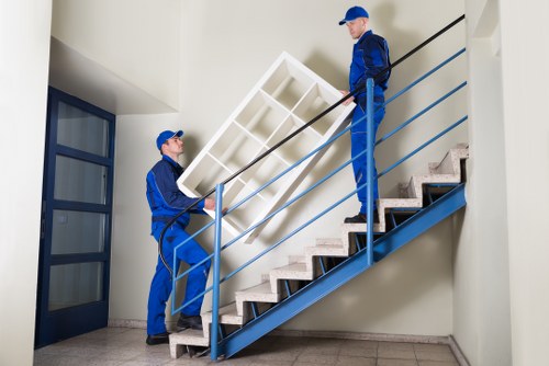 Removal van and moving team preparing for a Tufnellpark home relocation