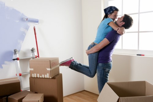 Trained van crew using lifting techniques and PPE during a Tufnell Park move