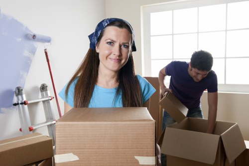 Supervisor checking complaint records for a man with a van service
