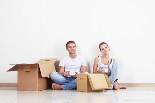 Organised home moving day with labelled boxes and removals support