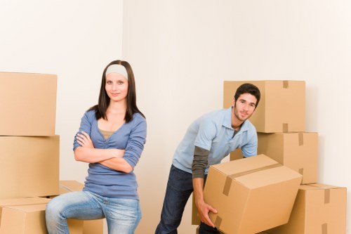 Packed moving boxes and protective wrapping used by Tufnellpark removal companies