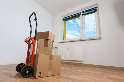 Loading furniture into a moving truck near Tufnell Park homes